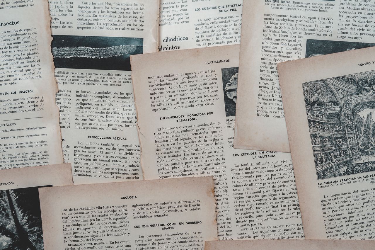 about-03 A collection of vintage Spanish book pages, showcasing classic literature and historical writings, Venezuela.